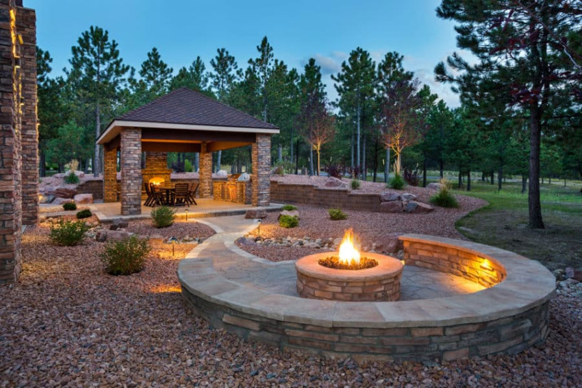 A fire pit can be a great addition to your patio. Source: Own the Yard